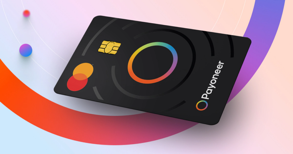 Black Payoneer prepaid Mastercard with the rainbow-ring logo and gold chip on a colourful gradient
