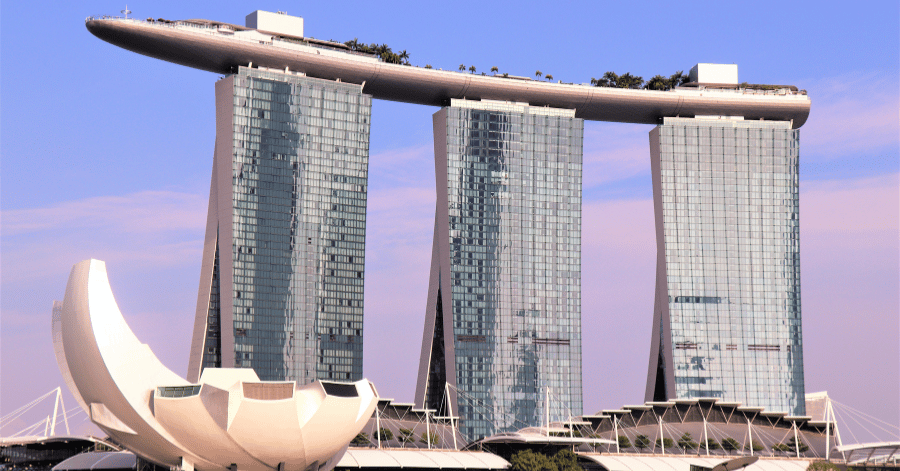 Marina Bay Sands and the ArtScience Museum against a clear sky in Singapore