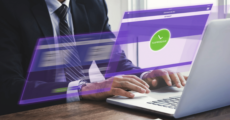 Businessman at a laptop with an overlaid graphic of a successful online bank transfer