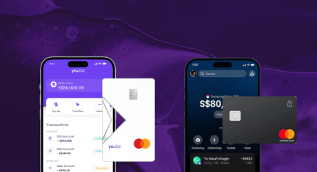 YouBiz app and white card beside the Revolut Business app and black card