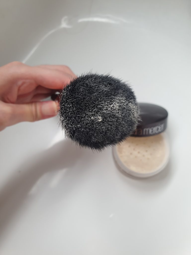 Use Laura Mercier foundation with a brush for face mask makeup