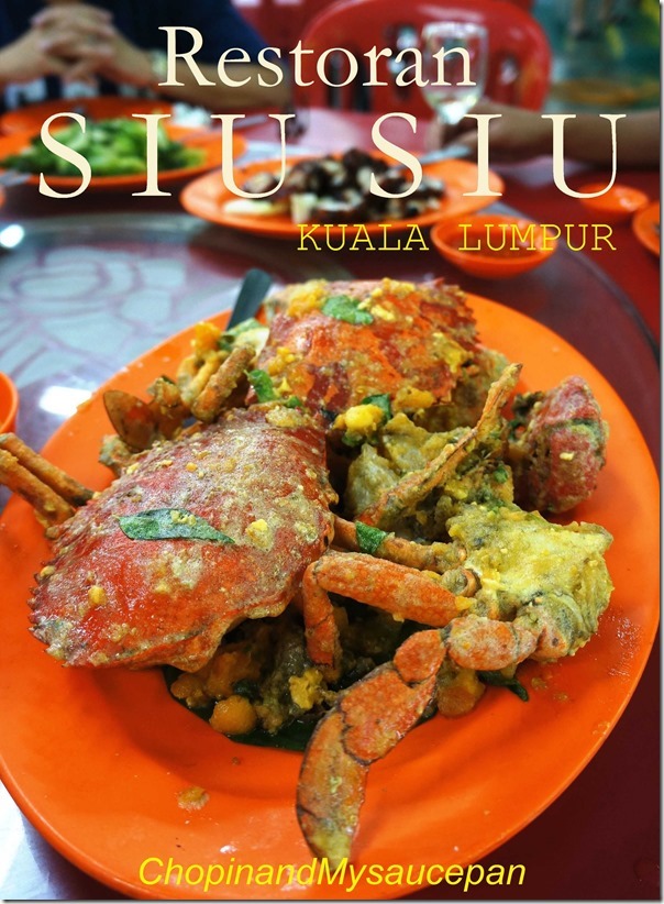 Plate of fried crab with salted egg on an orange table at Restoran Siu Siu
