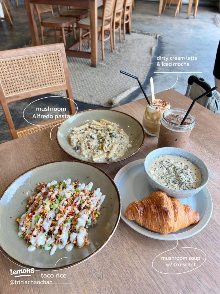 A brunch spread of pasta, taco rice, soup and iced coffee at Olive & Co, Batam