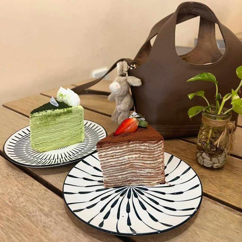 Slices of matcha and chocolate mille crepe cake at Meilleur patisserie, Batam