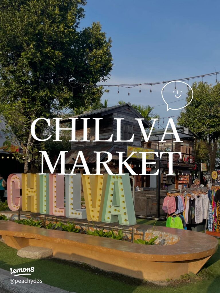 Colourful illuminated CHILLVA marquee letters at the entrance to Chillva night market