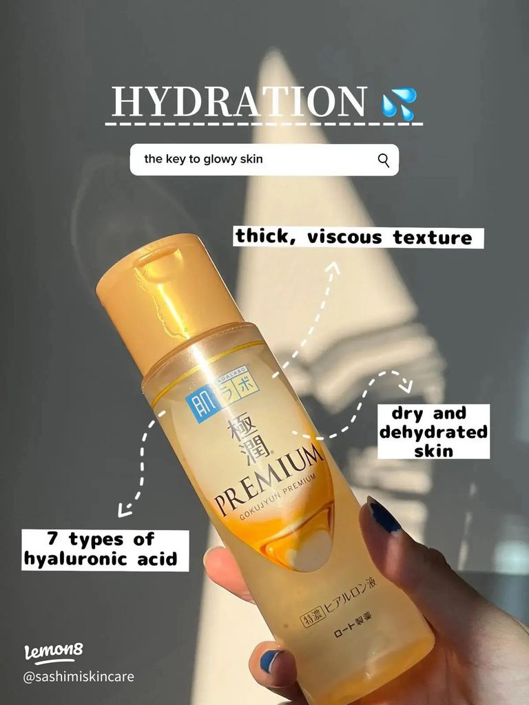 Bottle of Hada Labo Gokujun Premium hyaluronic acid lotion held in hand