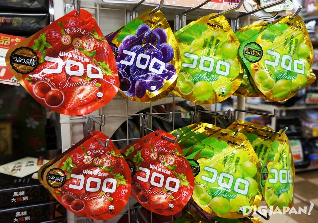 Kororo fruit gummy bags on a store display, including the matcha, strawberry, grape, and muscat flavours