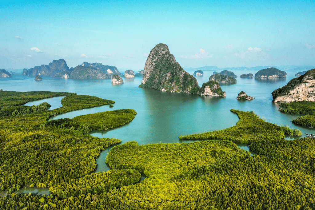 Aerial view of limestone karsts and green mangroves across Phang Nga Bay from Samet Nangshe