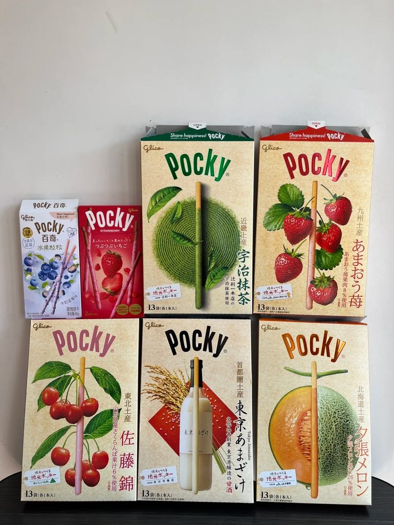 Pocky boxes in Japan-exclusive flavours including Uji matcha, Amaou strawberry, Sato Nishiki cherry, Tokyo amazake, and Yubari melon