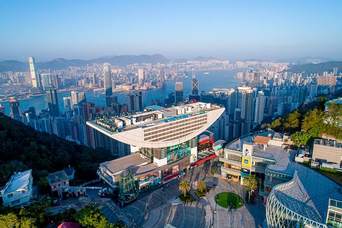 Aerial view of the Peak Tower and Sky Terrace 428 with Hong Kong's skyline and Victoria Harbour beyond