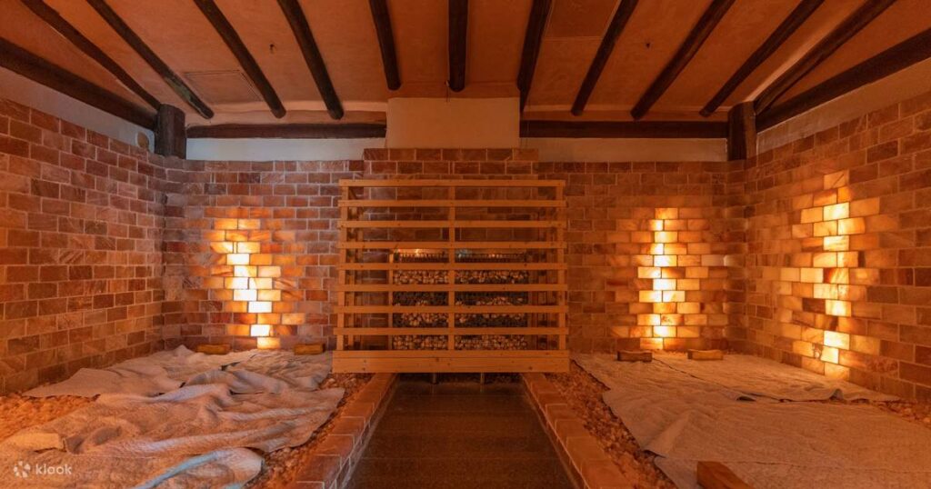 Salt-brick sauna room with floor mats in a Busan jjimjilbang