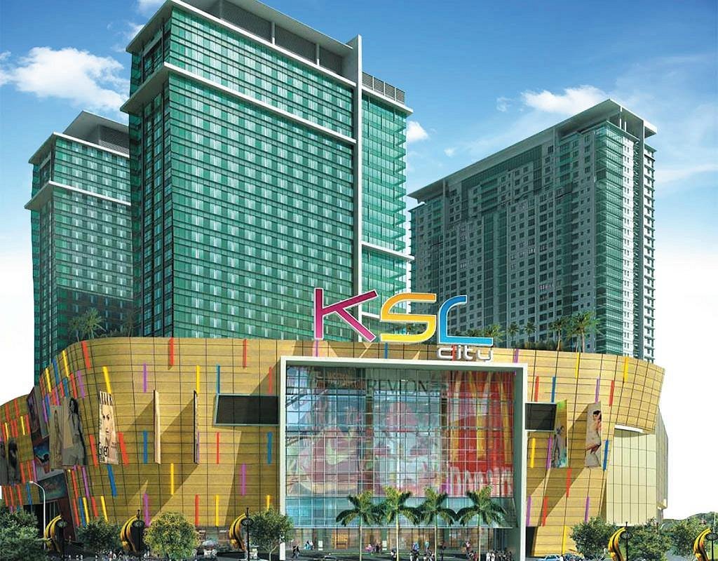 KSL City Mall's gold facade beneath its green residential towers in Johor Bahru