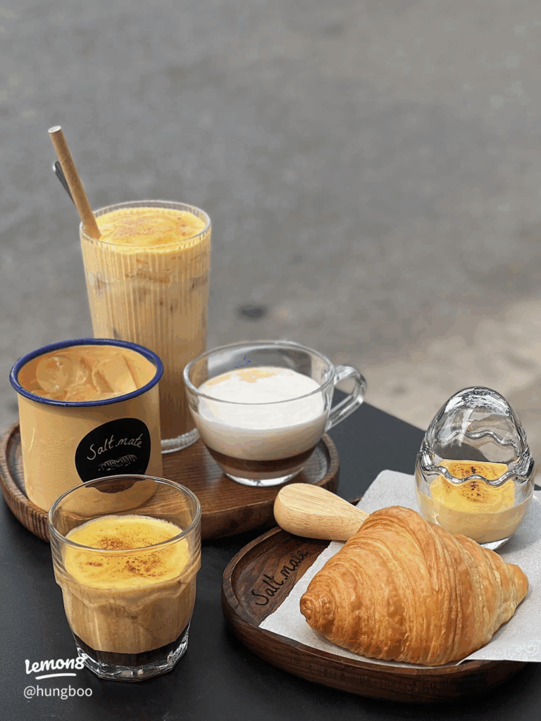 Glass of iced salt coffee with a thick salted cream cap over dark coffee