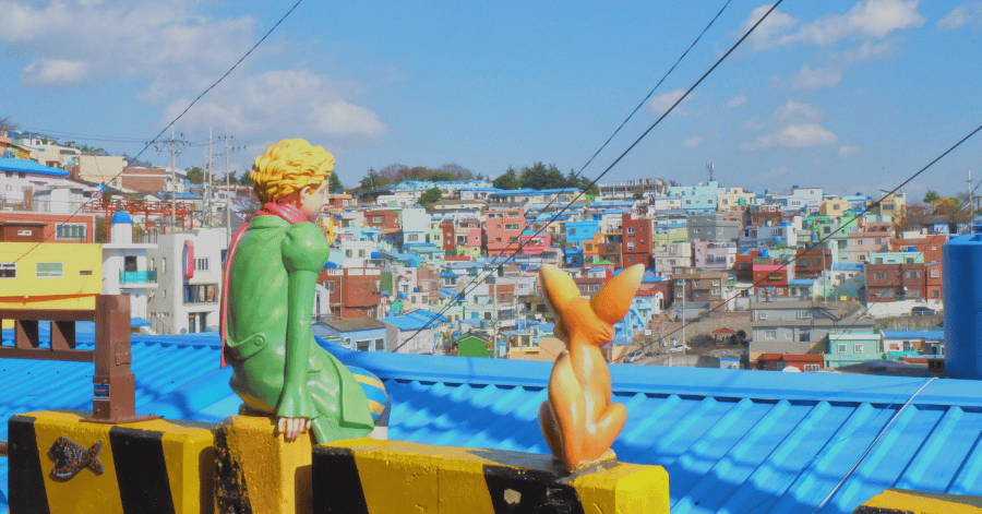Little Prince and fox statues overlooking Gamcheon Culture Village's colourful houses