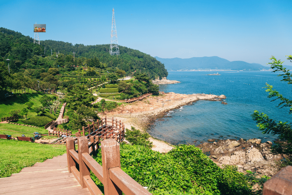 Coastal boardwalk and island-dotted sea at Tongyeong