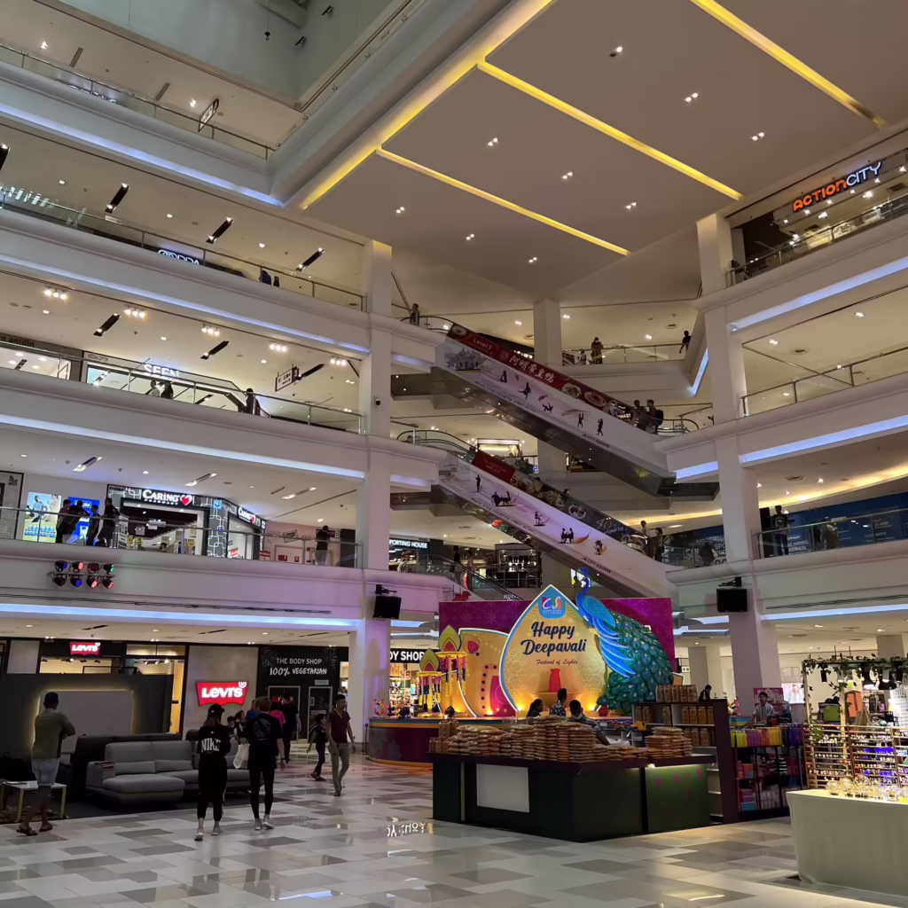 City Square JB's multi-storey atrium with escalators, shops and a Deepavali display