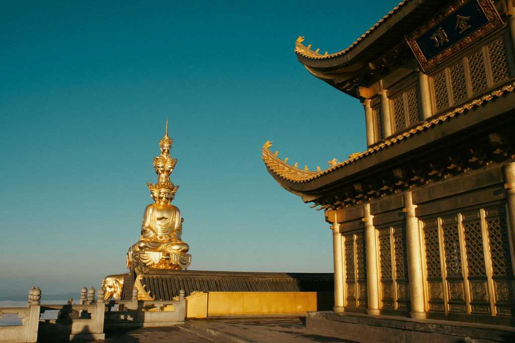 Misty, temple-topped forested peaks of Mount Emei near Chengdu