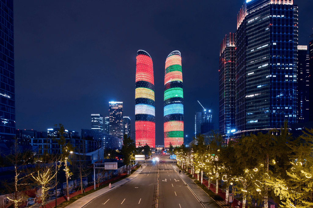 The Financial City Twin Towers lit up in colour at night, Chengdu