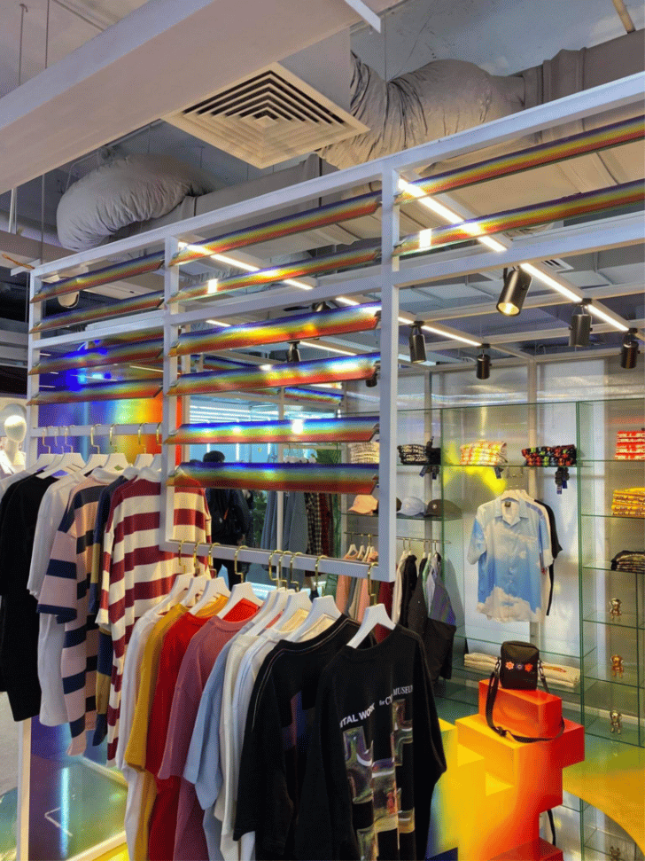 Clothing racks and streetwear displays inside The New Playground mall