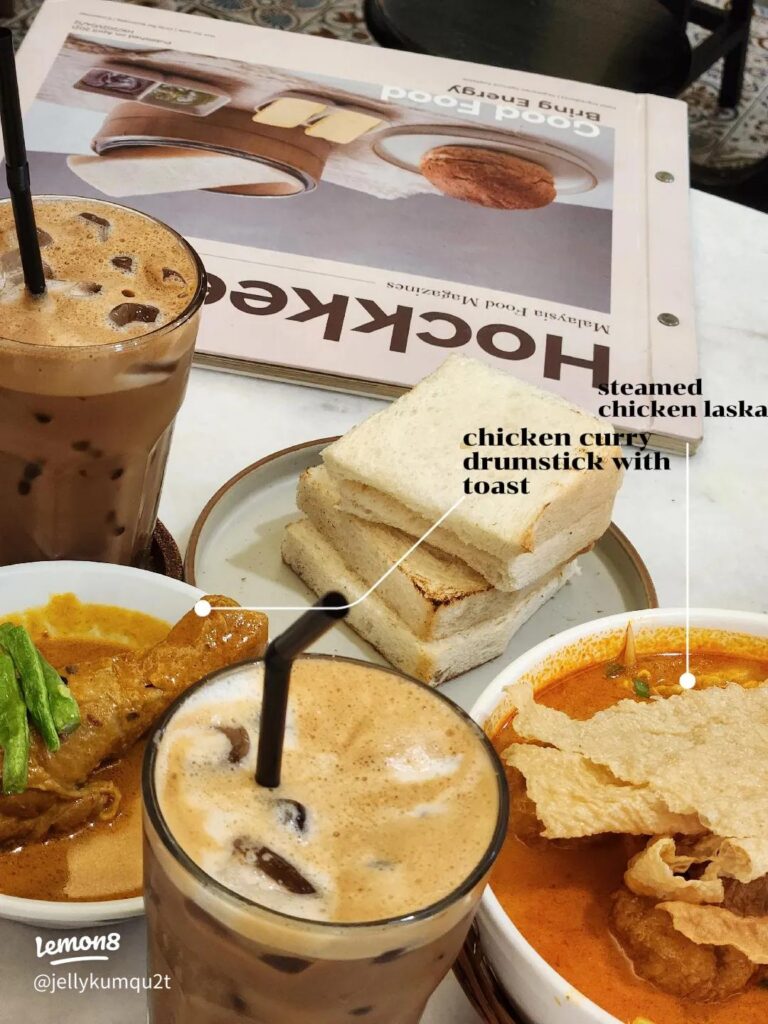 Kopitiam breakfast spread at Hock Kee: kaya toast, iced kopi, chicken curry and laksa