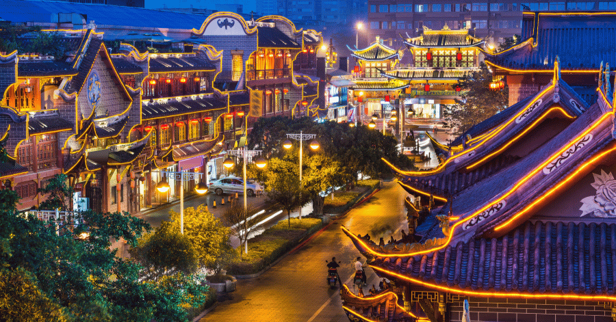 Chengdu's traditional-architecture district glowing with lights at night