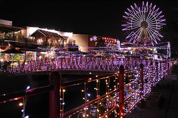 Mihama American Village lit up at night with its Ferris wheel and festive lights