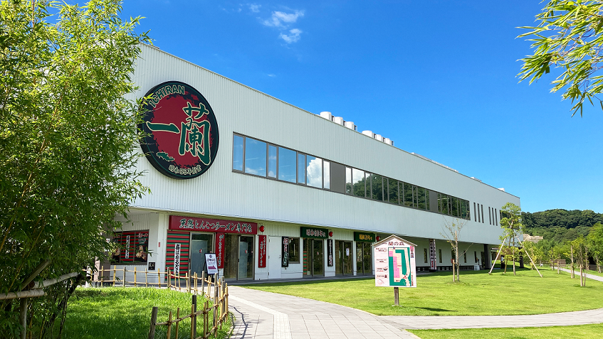 The Ichiran no Mori ramen factory building with its large red Ichiran logo in Itoshima