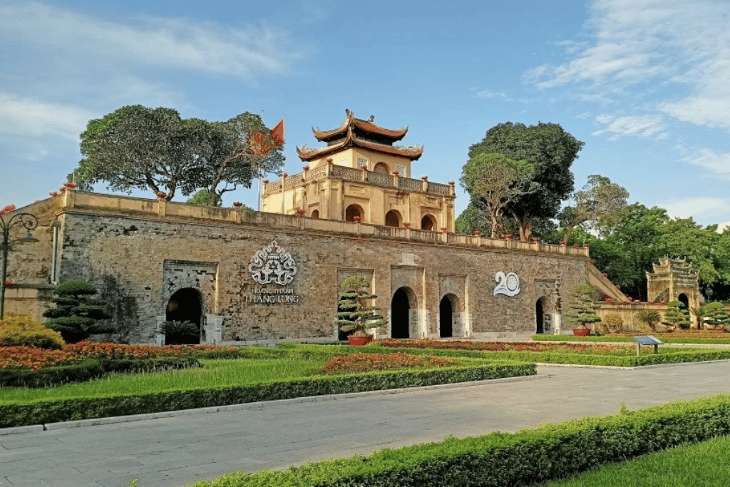 Doan Mon gate of the Imperial Citadel of Thang Long behind clipped topiary gardens