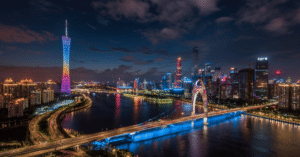 Guangzhou's night skyline with the illuminated Canton Tower and Liede Bridge over the Pearl River
