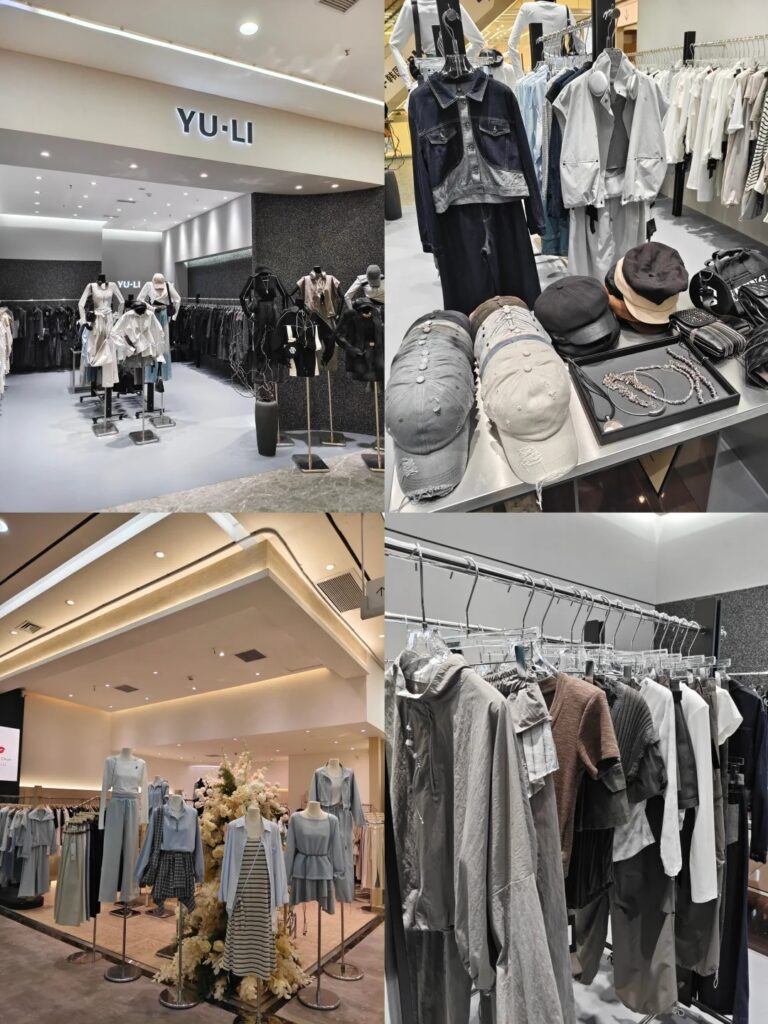 Clothing racks, mannequins, and accessories inside a Guangzhou wholesale fashion mall
