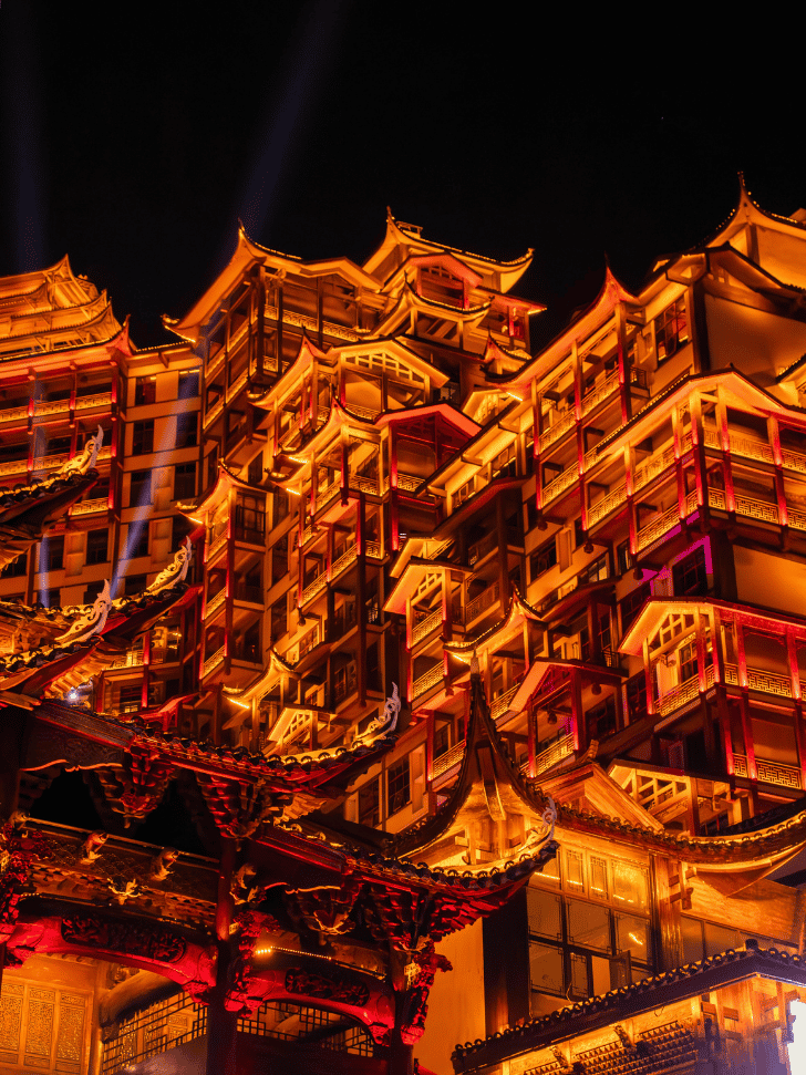 Hongyadong's stacked stilt houses lit up at night, Chongqing
