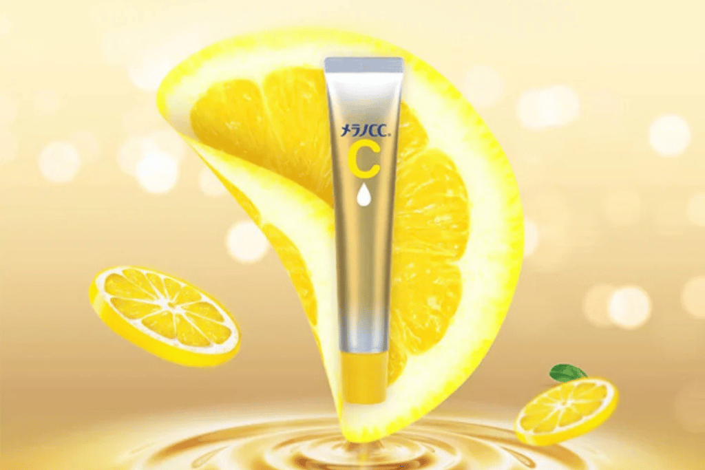 Rohto Melano CC vitamin C serum tube beside a fresh lemon slice