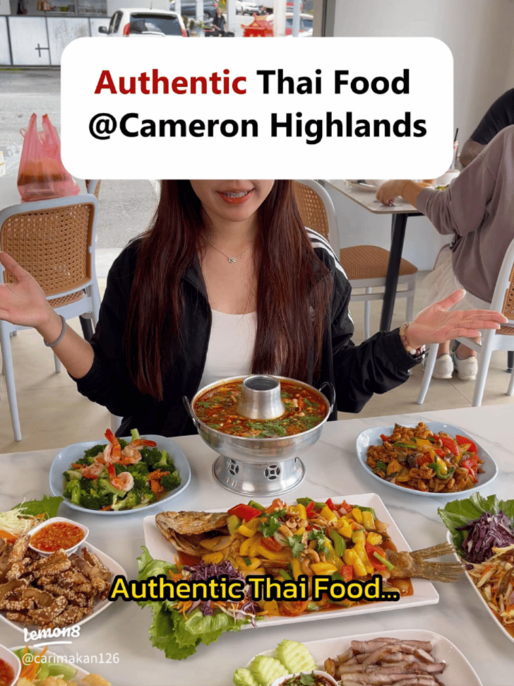 A shared table spread of Thai dishes at a Cameron Highlands restaurant