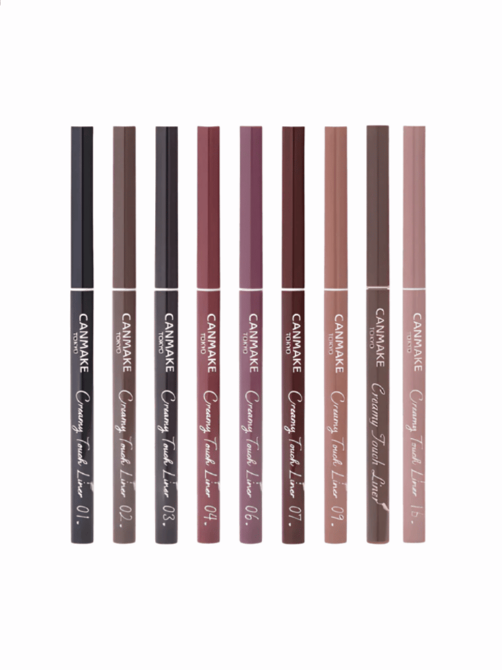 Nine shades of Canmake Tokyo Creamy Touch Liner eyeliner pens lined up in a row