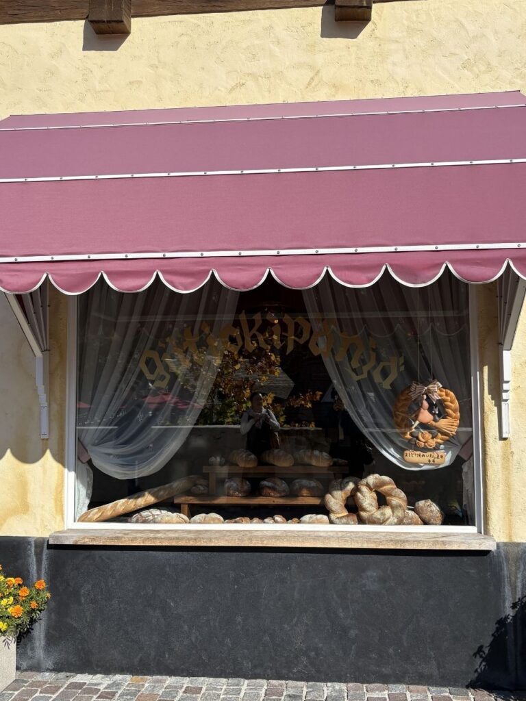 Guchokipanya bakery window full of bread, from Kiki's Delivery Service, in the Valley of Witches