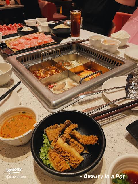 Divided broth hotpot with a side dish at Beauty in the Pot, Genting