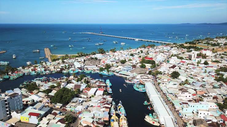 Aerial of Duong Dong town and its harbour packed with fishing boats on Phu Quoc