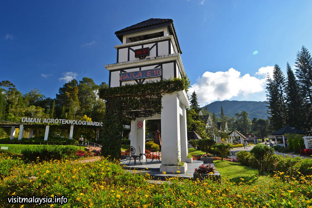 Clock tower and flower gardens at the entrance to MARDI Agro Technology Park