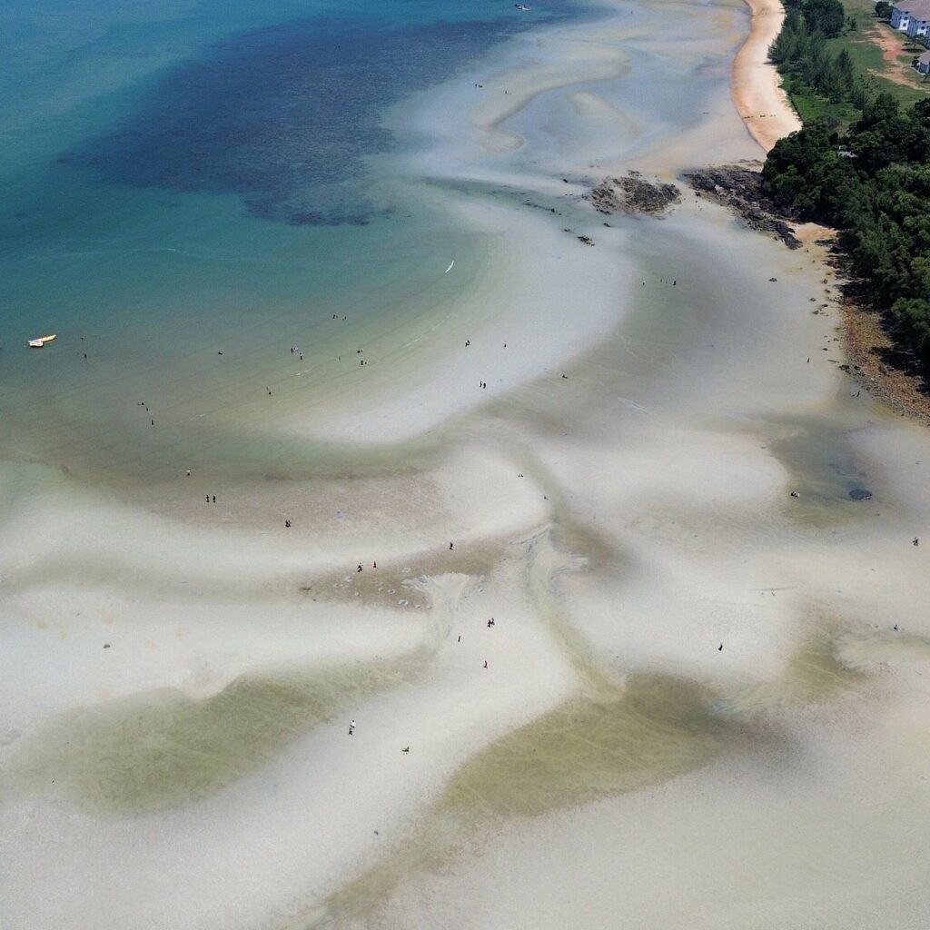 Aerial view of sandbars and turquoise shallows at Blue Lagoon, Port Dickson