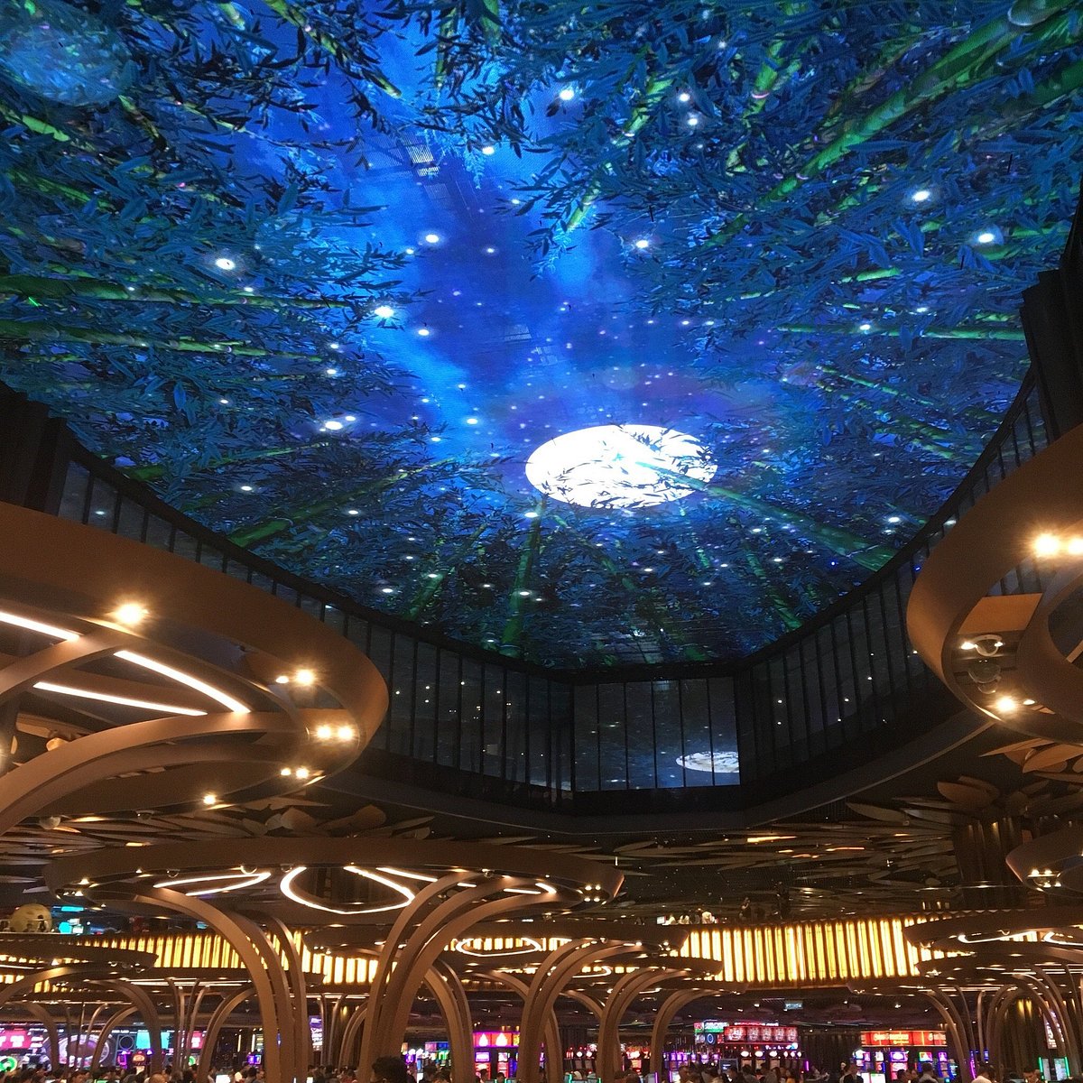 Illuminated domed ceiling and curved interior of SkyCasino at Genting
