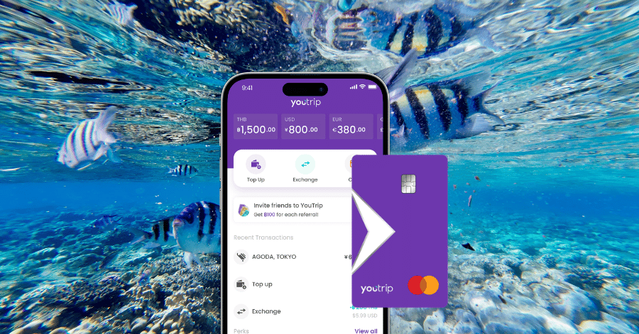 The YouTrip card and mobile app shown over an underwater snorkelling scene