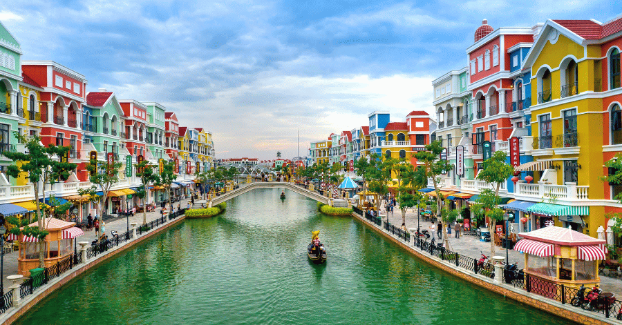 Colourful buildings and a gondola on the Venice-style canal at Grand World, Phu Quoc