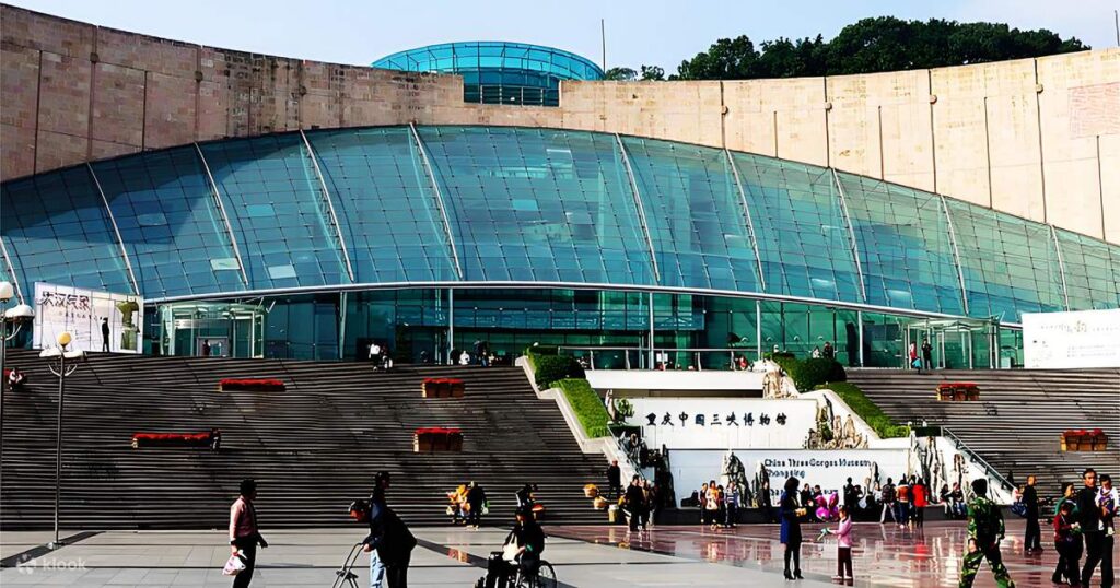 The curved glass facade of the Chongqing China Three Gorges Museum