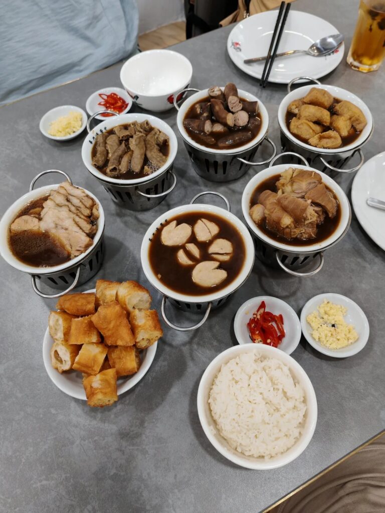 Bak kut teh at Pao Xiang: bowls of herbal pork-rib soup with you tiao, rice and condiments