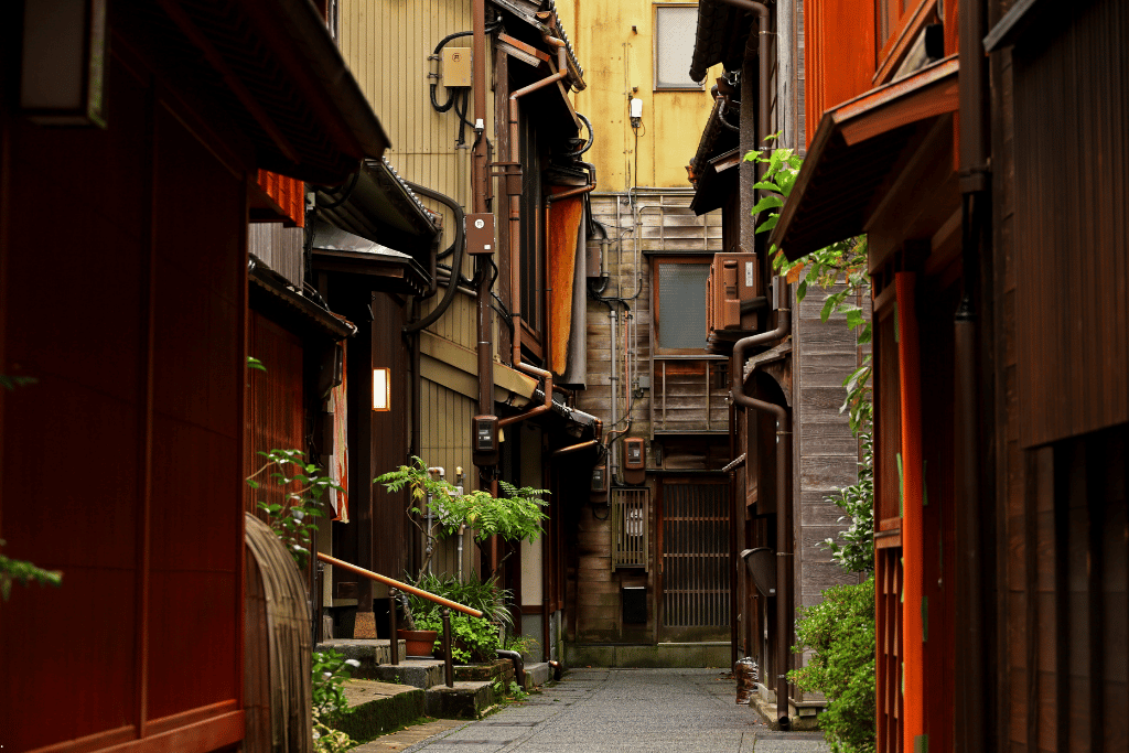 Narrow quiet lane between old wooden houses in Kanazawa's Kazuemachi district