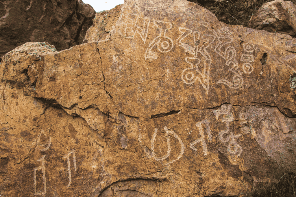 Ancient Bronze Age rock carvings etched into stone at Tamgaly