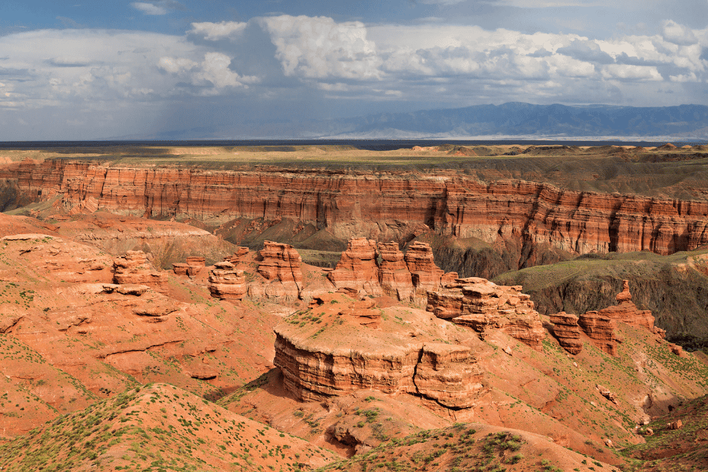 Red sandstone rock towers in Charyn Canyon's Valley of Castles