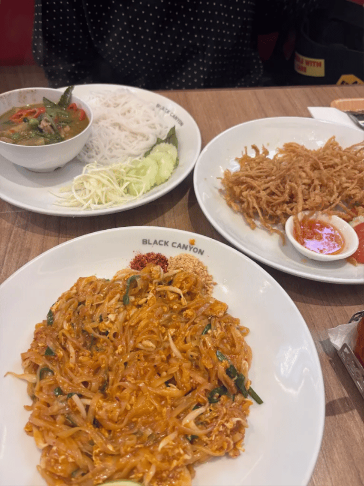 Thai dishes at Black Canyon: pad thai, green curry with rice vermicelli and a crispy fried dish