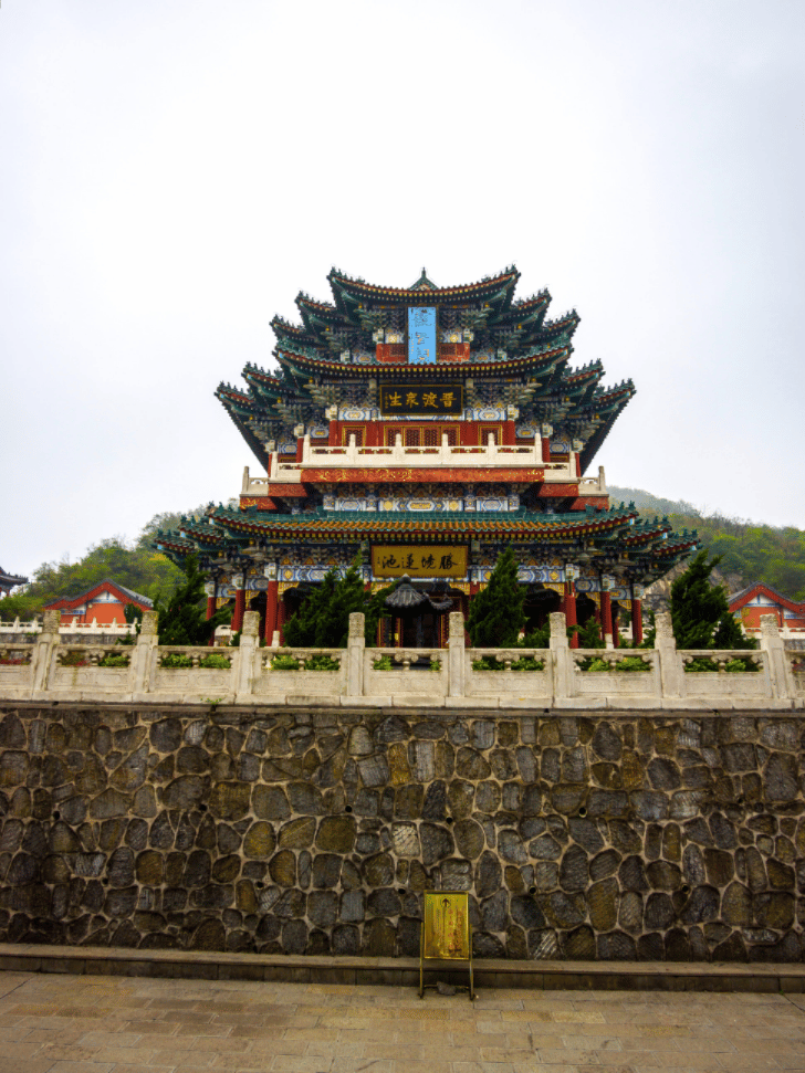 The tiered roofs of Tianmen Mountain Temple above a stone terrace