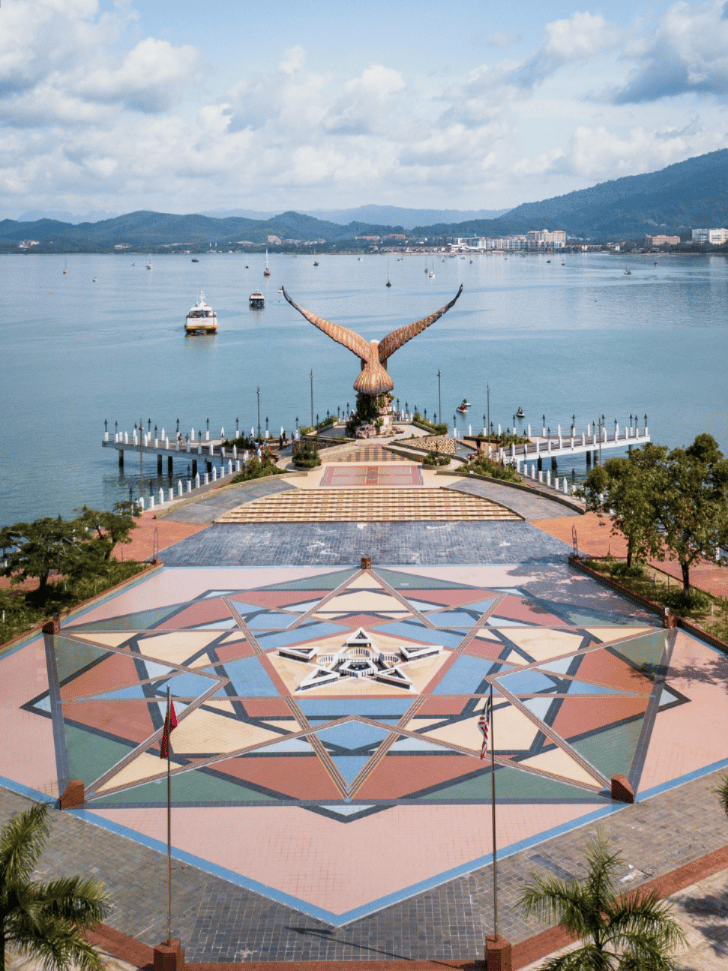 Aerial view of Eagle Square's giant eagle statue and geometric plaza in Kuah, Langkawi